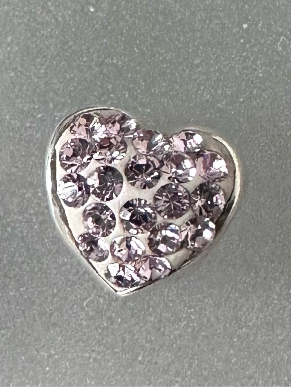 Sterling silver slide pendant embellished with light pink rhinestones